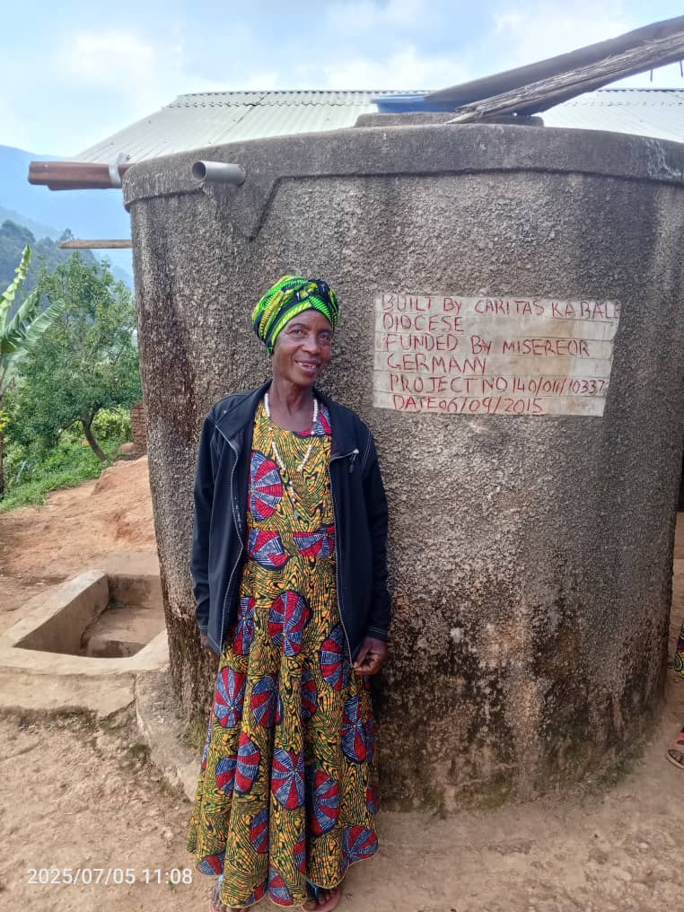 Mrs Feresta sustains a water harvesting tank for 10 years